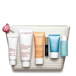 Clarins - Relaxing Weekend Partners Confezione Regalo 50 Ml Beauty Flash Balm + 100 Ml Crema Mani Ed Unghie + 50 Ml One-Step Gentle Detergente Esfoliante + 15 Ml Hydra Quench Crema + 30 Ml Instant Struccante Occhi + 3 Ml Wonder Perfect Mascara + Borsa